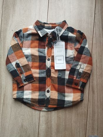 Veste sur chemise neuve orchestra