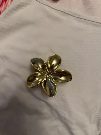 pince fleur dorée
