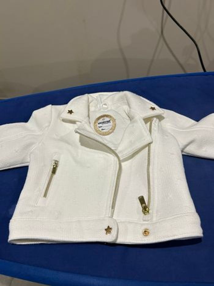 Veste tape à l’œil