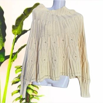 Superbe poncho mailles ajourées à manches