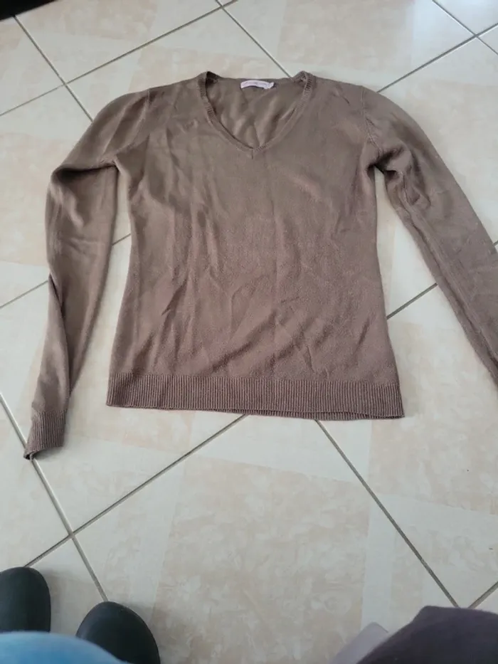 Pull taille s