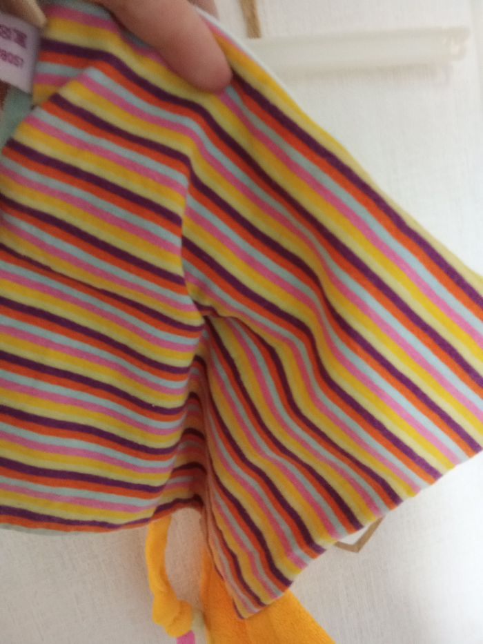 Doudou lion Orange, jaune, blanc, bleu, vert, rayures marque pommette - photo numéro 5