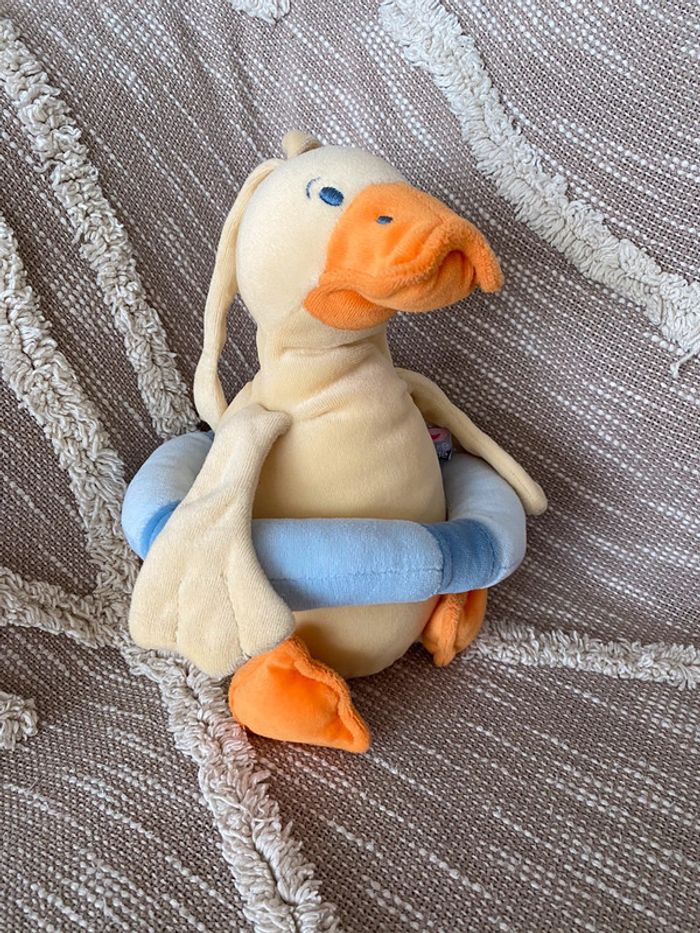 Peluche doudou musical 33cm Sucre d'Orge canard jaune orange et bleu très bon état - photo numéro 2