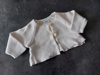 Gilet tape a l'œil 3 mois en très bon état