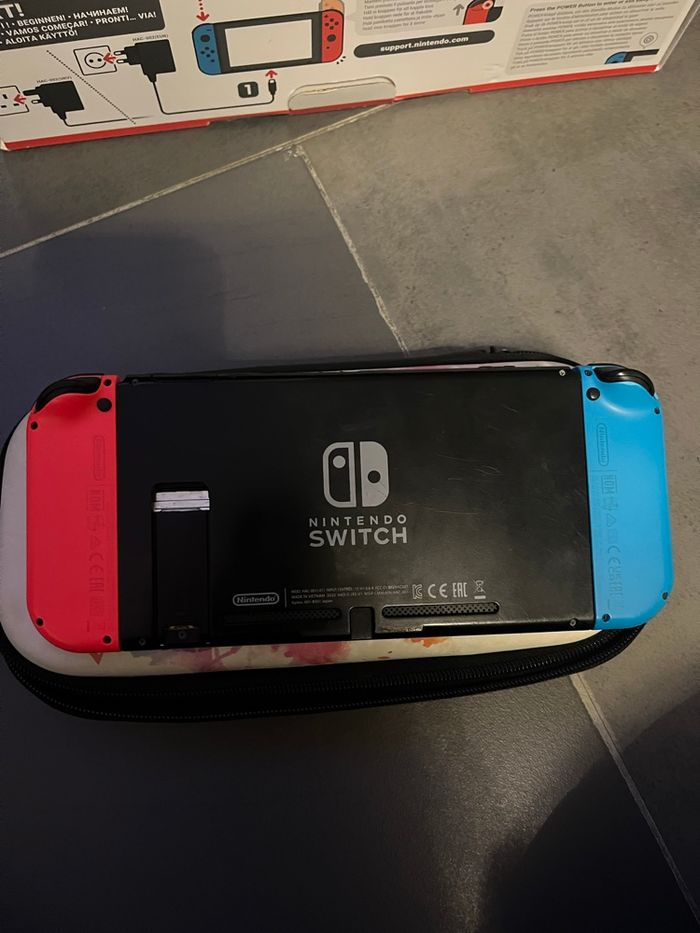 Nintendo switch + boite d’origine + chargeur + joycon - photo numéro 3