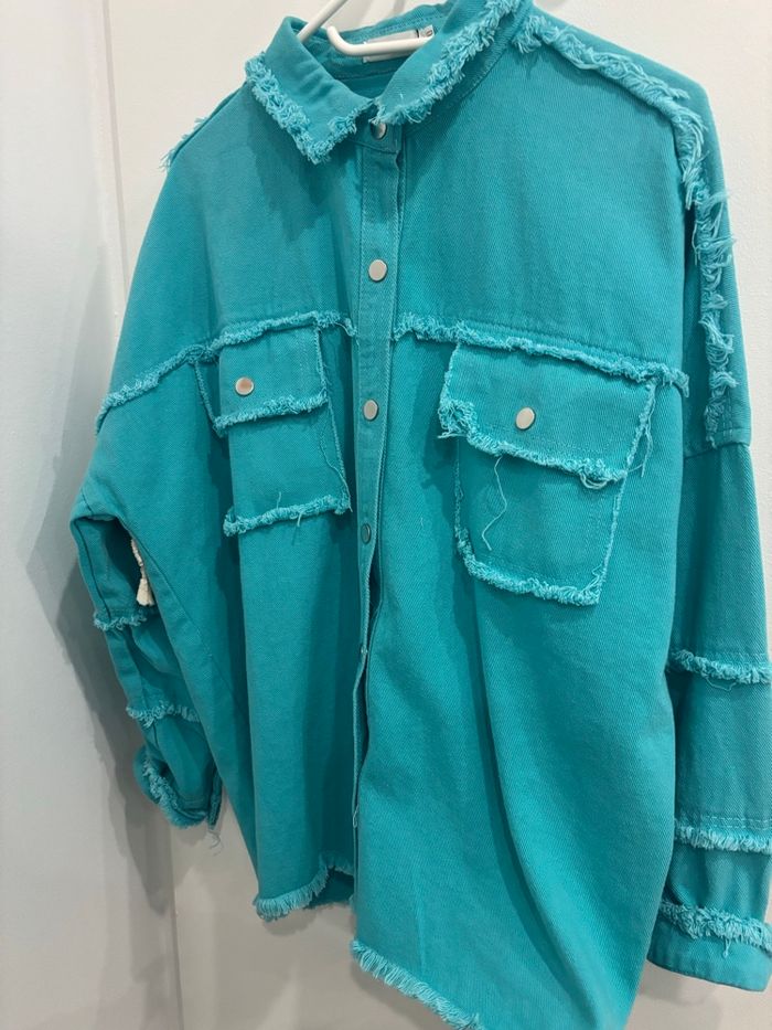 veste bleue, taille unique, flamant rose