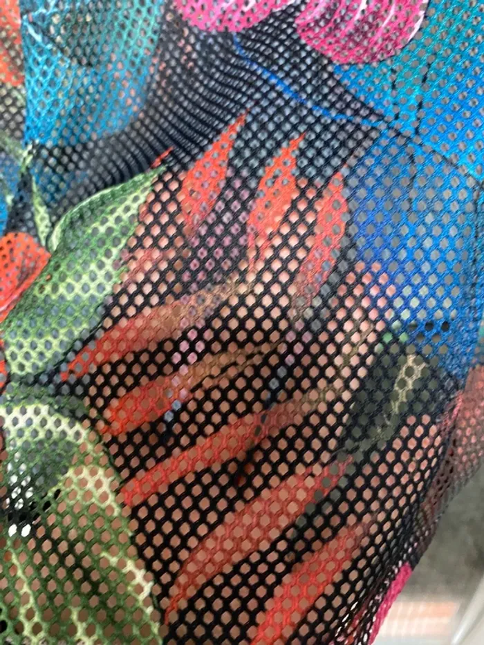 Camiseta con agujeros - photo numéro 2