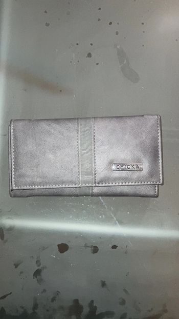 Grand portefeuille femme gris.
