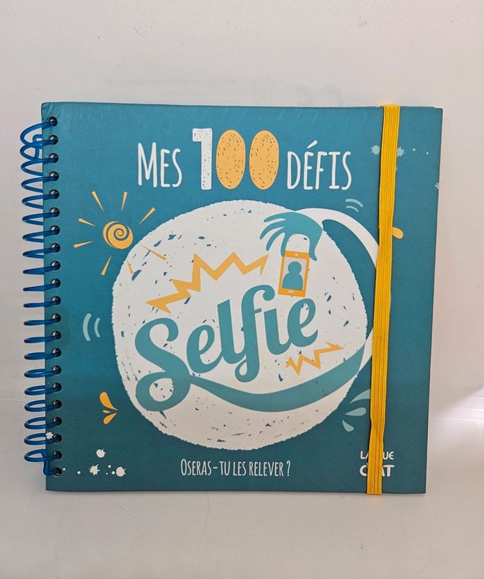 Carnet souvenir photos, "mes 100 défis selfie".
Neuf