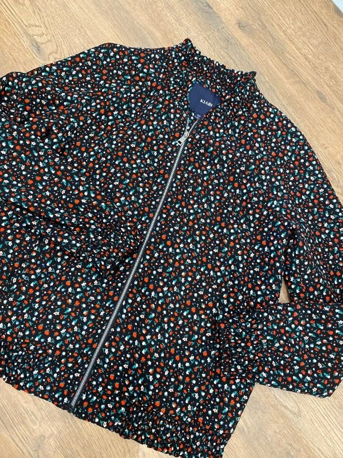 Veste fille fleurie taille 12 ans