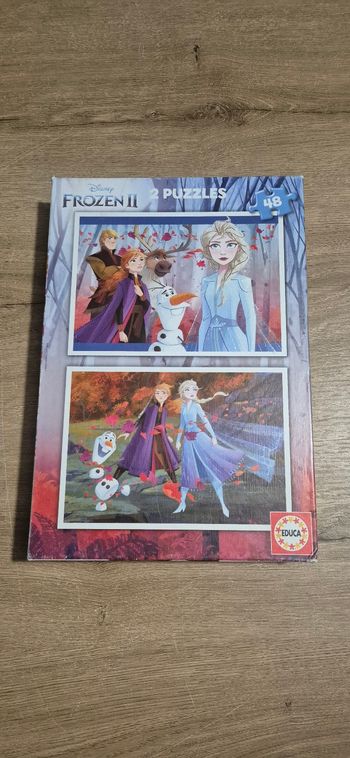 2 puzzles La Reine des neiges