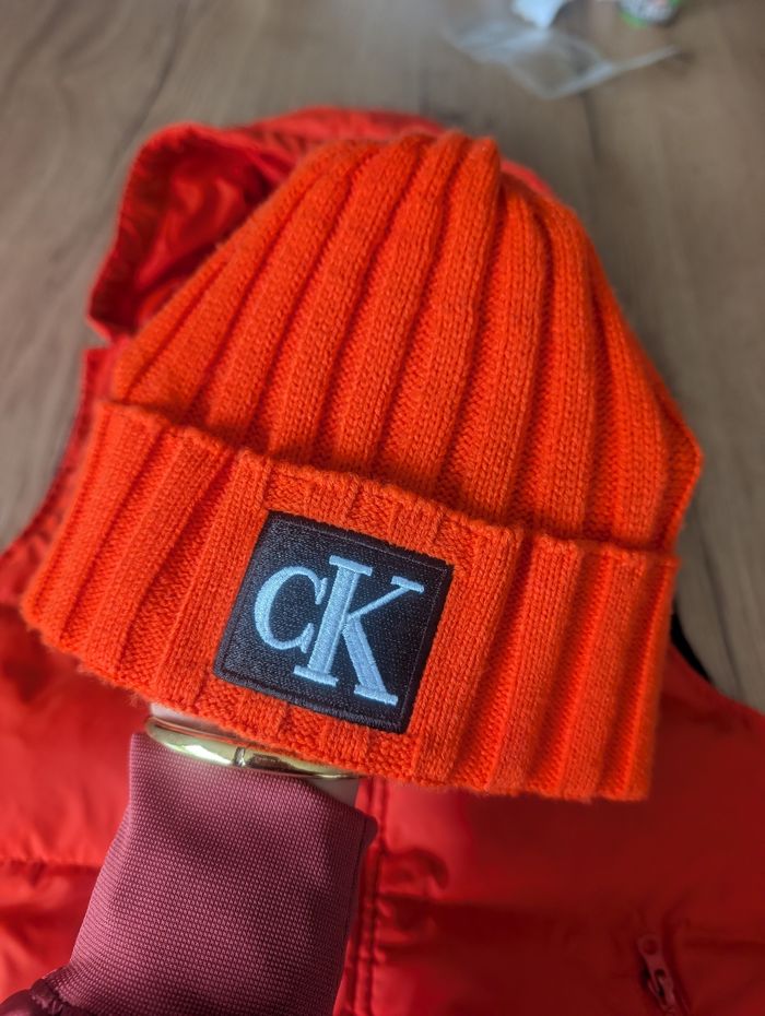 Doudoune 7 ans + bonnet calvin Klein - photo numéro 2