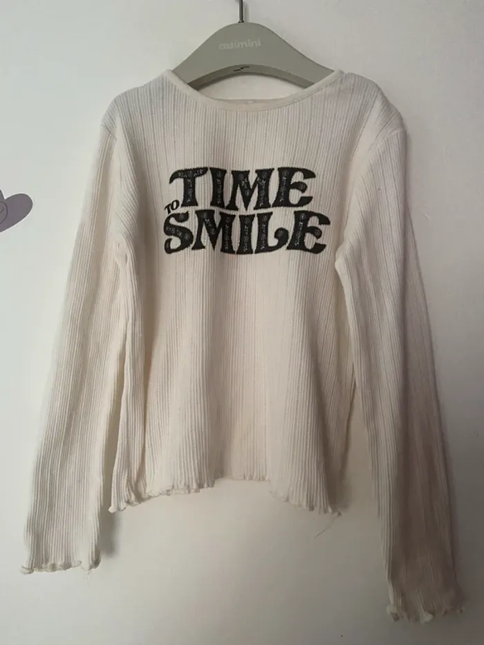 T-shirt manches longues .