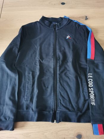 Gilet zippé noir sans capuche le coq sportif 14 ans en bon état