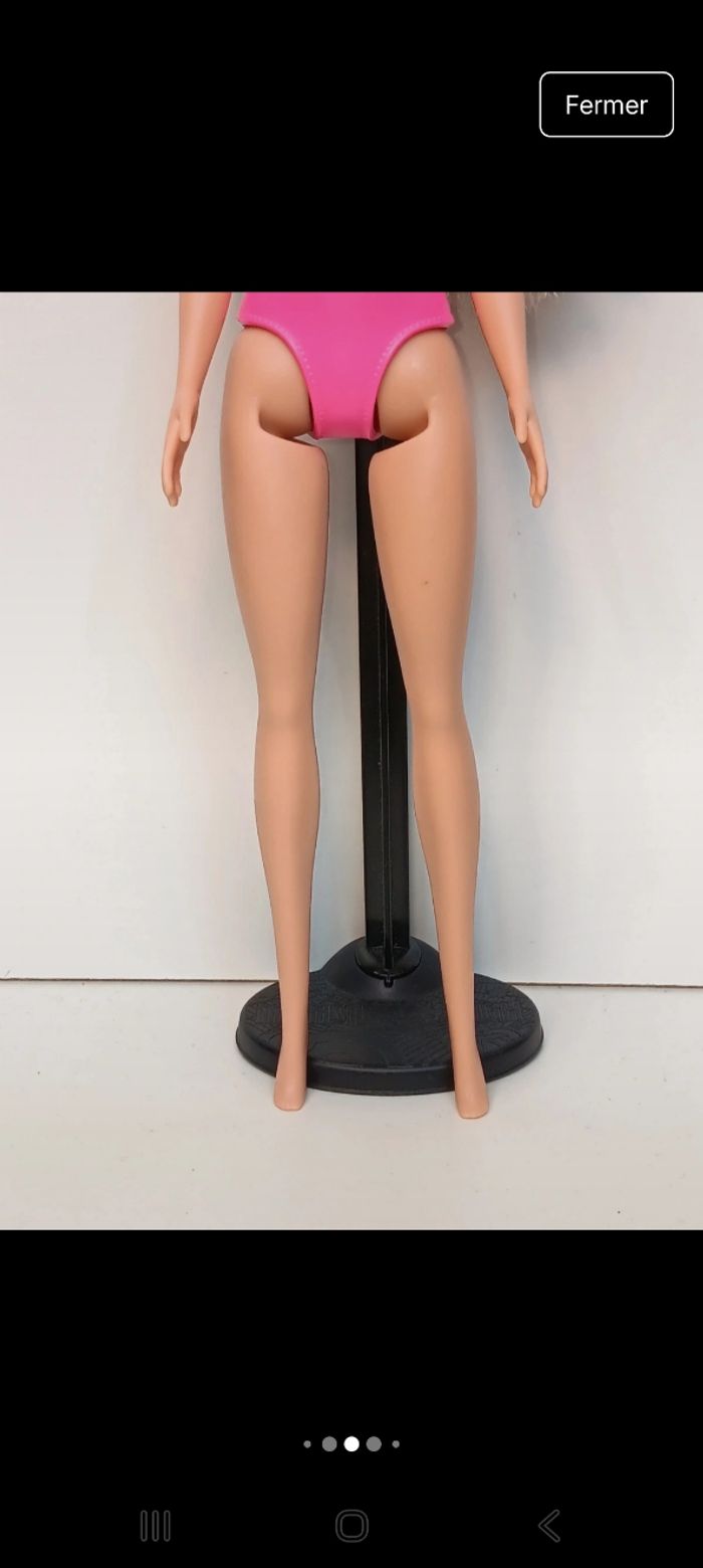 Poupée mattel barbie maillot fushia et mauve tête 2013 corp 2017 
Poupée et ensemble compris - photo numéro 5