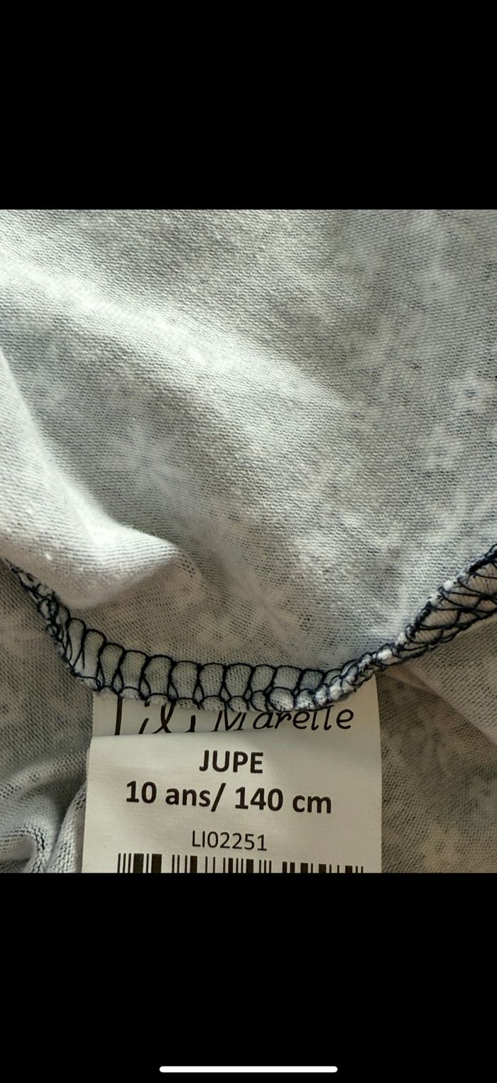 Jupe patineuse marine à fleurs 10 ans - photo numéro 6