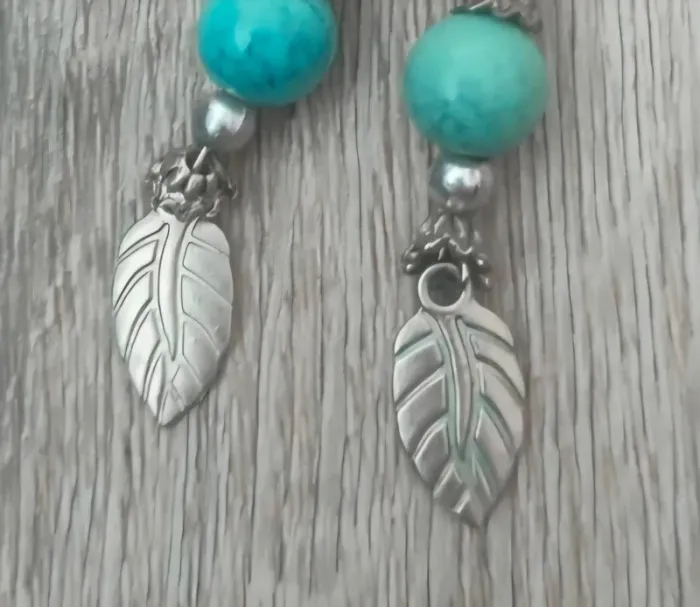 Boucles d'oreilles pendantes plume - photo numéro 2