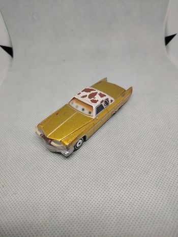 Voiture cars disney metal tex dinoco yeux lenticulaires bon état