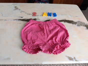 Short fille rose fushia 23mois
