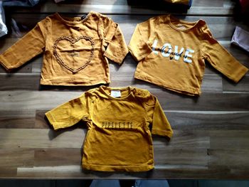 Haut manche longue × 3 couleur moutarde Kiabi 1mois