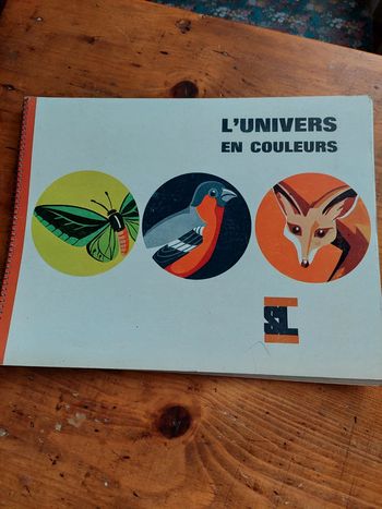 Album chromos l'univers en couleurs Biscottes Saint Luc