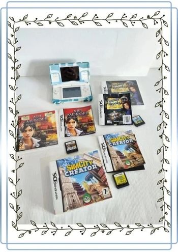 Lot nintendo ds avec une nintendo blanche en bon état mais il y'a des traces + 3 jeux