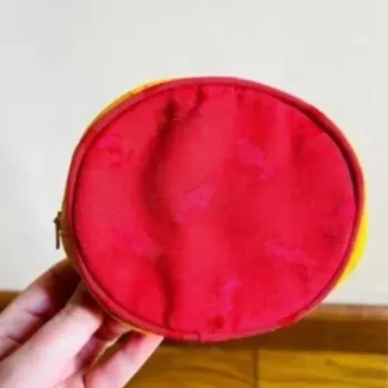 Sublime pochette rouge jaune ronde