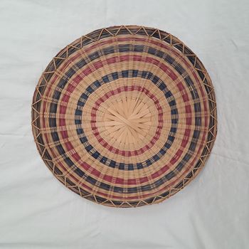 Décoration ronde murale en rotin osier multicolores du Laos