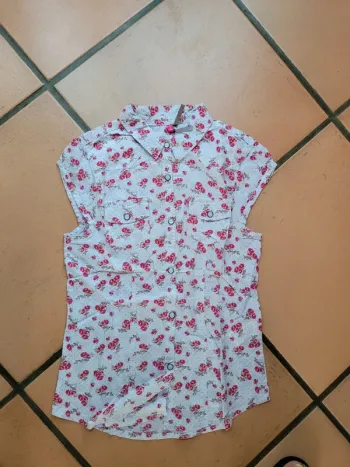 Chemise manches courtes fleurie 10 ans tbe
