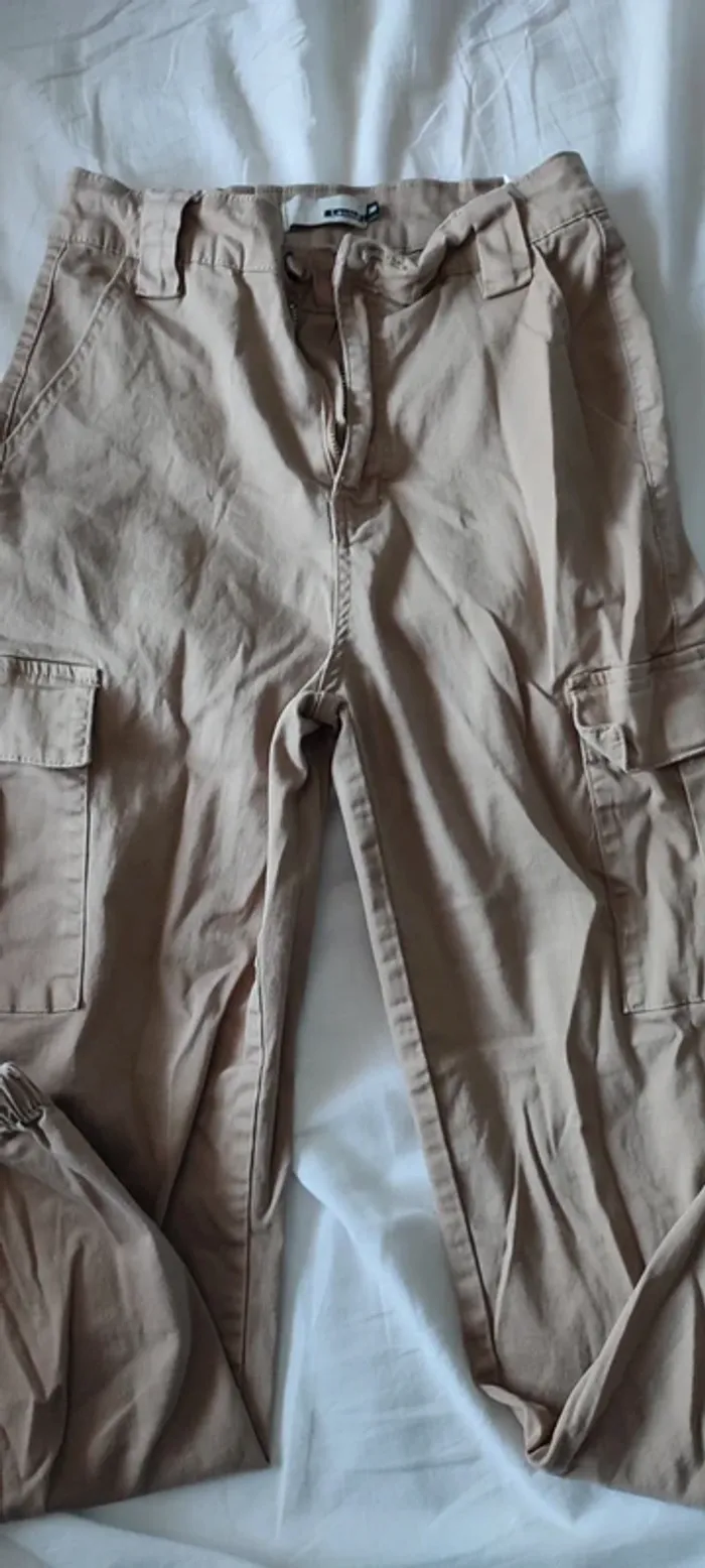 Pantalon avec poche sur les côté femme