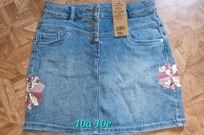 Jupe 10ans tape a loeil neuf