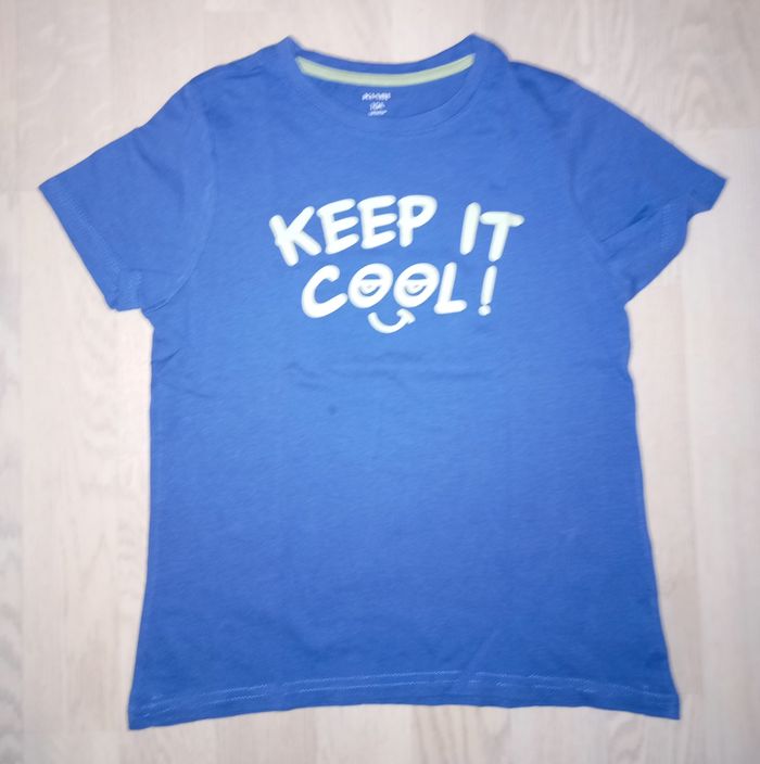 Tee-shirt bleu Kiabi 
T. 10 ans