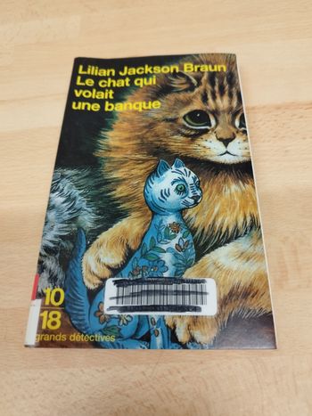 Lilian Jackson Braun

Le chat qui

volait

une banque