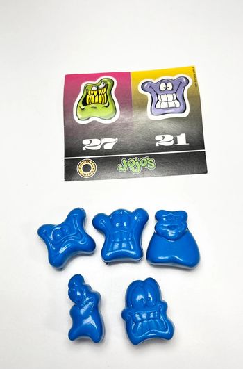 Lot 5 Jojo's  bleus + autocollant officiel 1995