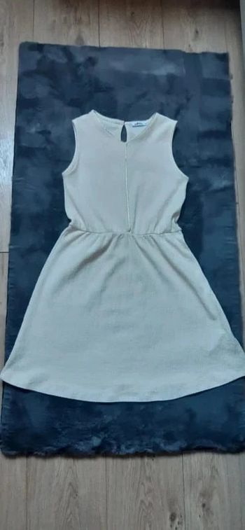 Robe gémo crème/dorée 10 ans état neuve