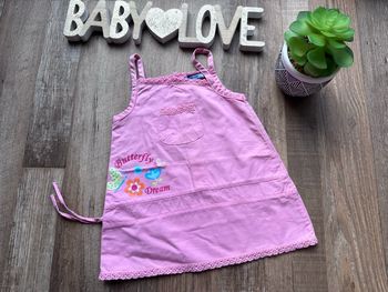 - Robe Premier rôle    - 6 mois - Très bon état