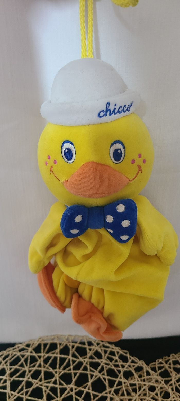 Peluche vintage musicale canard CHICCO jaune noeud papillon bleu bonnet 30 cm