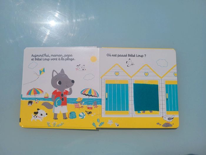 Bébé Loup à la mer 🏖 livre à caches feutrine - photo numéro 3