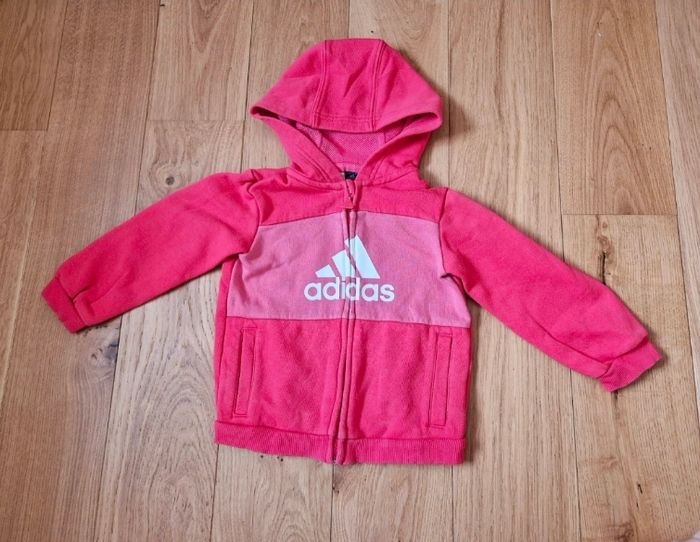 Gilet rose à capuche