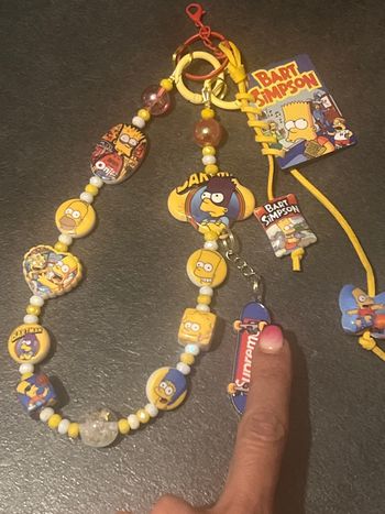 Porte clés /deco de portable/sac Simpsons family 