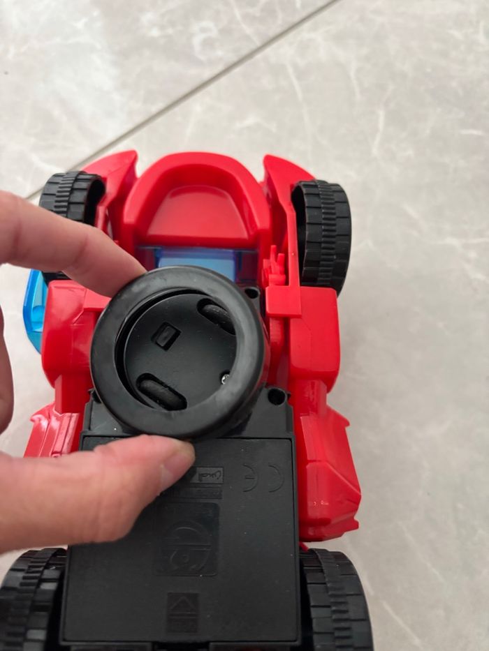 Jouet dinosaure /voiture qui se transforme avec sons et lumière avance seule rouge - photo numéro 7