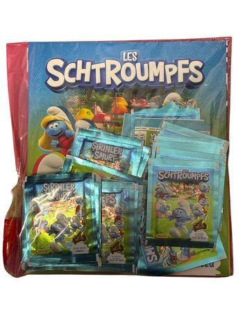Album cartes Panini les Schtroumpfs un monde magique tout en bleu + 50 pochettes de stickers neuf