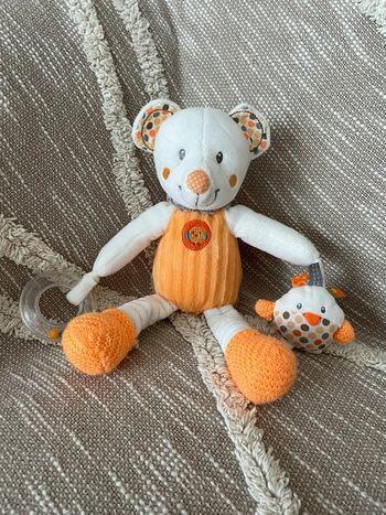 Peluche doudou d’éveil 28cm Nicotoy ours orange et blanc très bon état