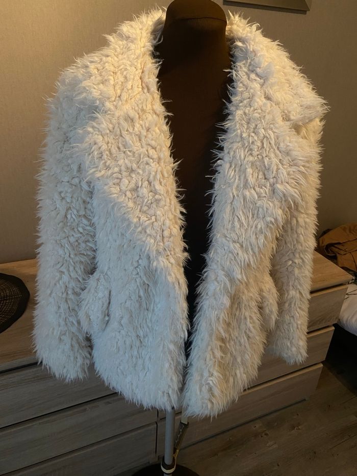 Manteau fourrure, moumoute
