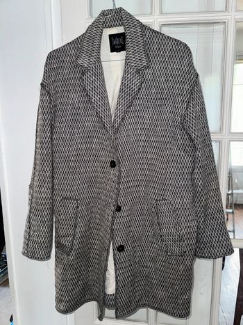 Manteau plutôt léger swildens  Taille 2 Valeur 250 euros