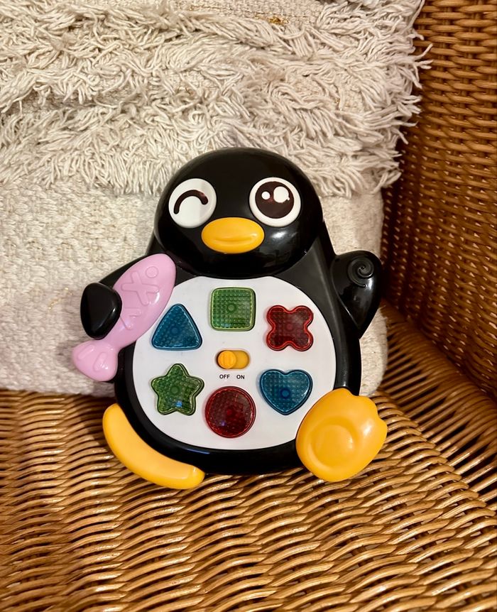 💜 Jeu musical pingouin Gifi noir et coloré 💜