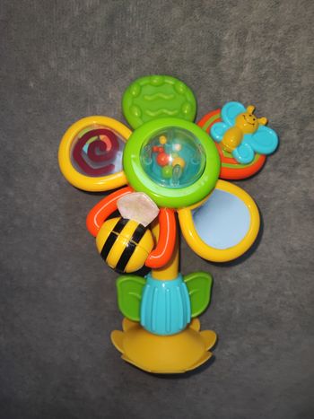 Hochet fleur chaise haute