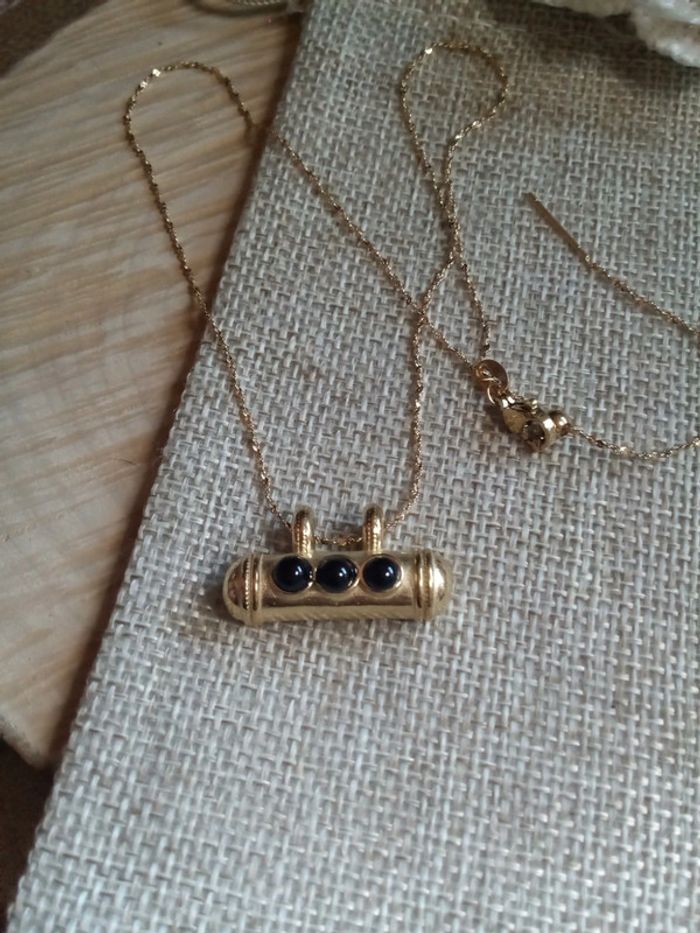 Collier noir et doré