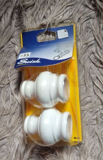 Embouts tringle à rideau en bois