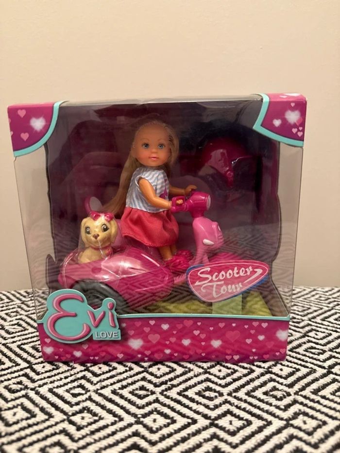Simba - Coffret Poupée Evi Love scooter tour et son petit chien.